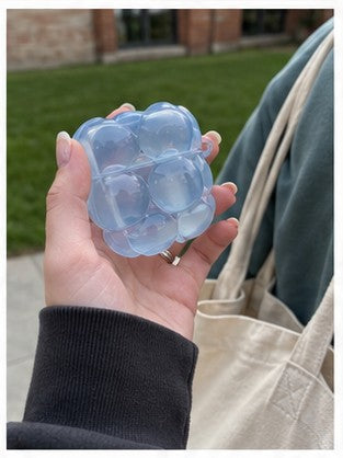 blue jelly puffy airpods case lifestyle image